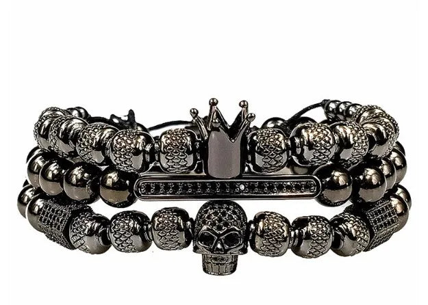 Buy Skull Crown Micro Pave CZ Copper Bracelet at Greater Goods - Adjustable Charm Braided Bangles in Gold and Silver