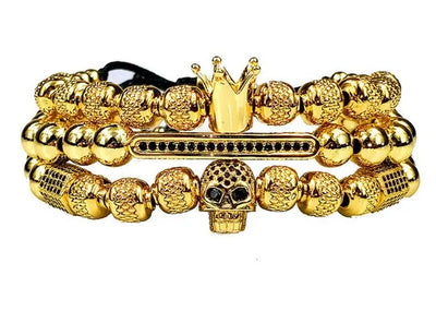 Buy Skull Crown Micro Pave CZ Copper Bracelet at Greater Goods - Adjustable Charm Braided Bangles in Gold and Silver