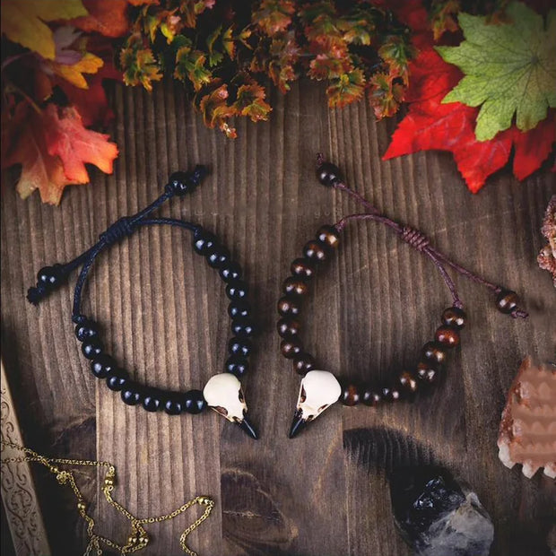 Buy Crow Skull Bracelet with Wood Beads - Unique Handmade Neo-Gothic Jewelry at Greater Goods